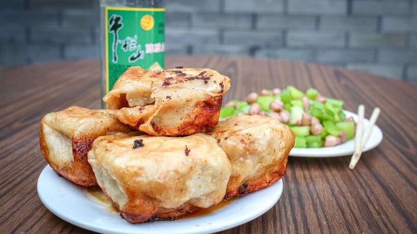 Beijing: Hidden Gems Guided Food Tour with Beer and Tastings - Hotpot in a copper pot with rooftop beer views