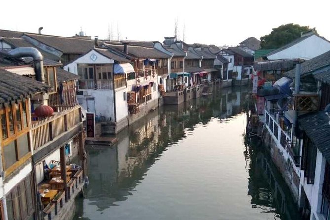 Half-Day Private Zhujiajiao Water Town Tour with Boat Ride from Shanghai - Ancient streets and Fangsheng Bridge: walk where the town’s story was built