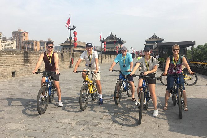 Mini Group Xian Day Tour to Terracotta Army, City Wall, Pagoda and Muslim Bazaar - Guides and Day Experience: What Names Signal in the Real World