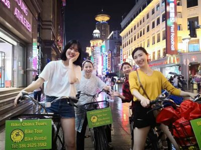 Shanghai: 4-Hour Nightlife Adventure & Tasting Bike Tour - Pudong’s Skyline at Night: Towers, Projections, and the Best Moving-Photo Angles