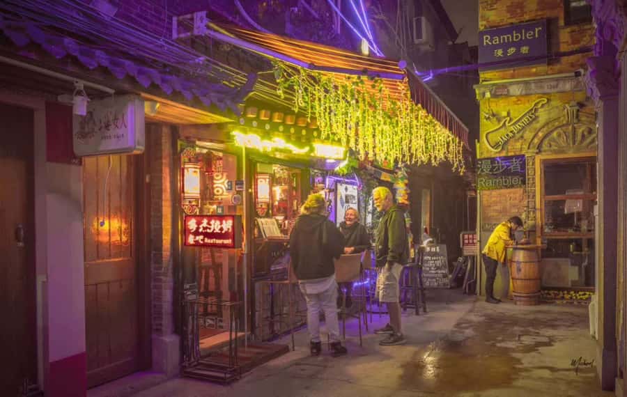 Shanghai: 4-Hour Nightlife Adventure & Tasting Bike Tour - Former French Concession to Jingan: Old Neighborhoods, New Night Lighting