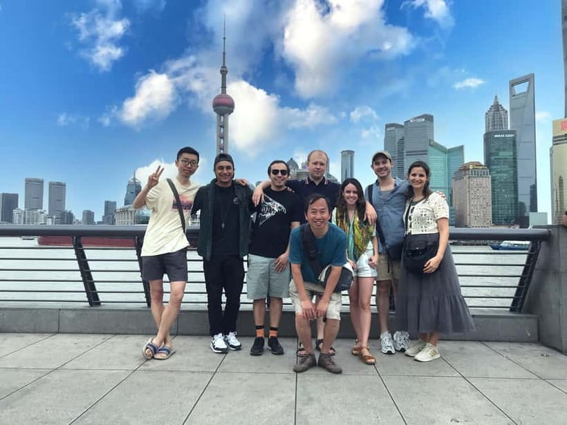 Shanghai Highlights Walking Tour With A Real Local - Finding your starting point at East Nanjing Road and Swatch Megastore
