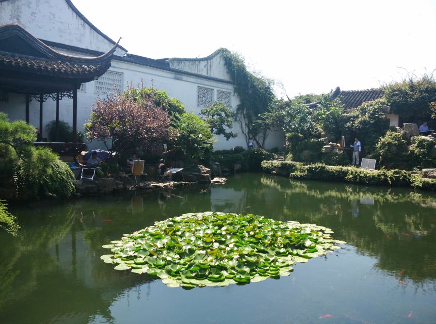 Su Zhou and Zhou Zhuang Water Village Day Tour - Sampan ride through Zhouzhuang: why that 20 minutes is worth it